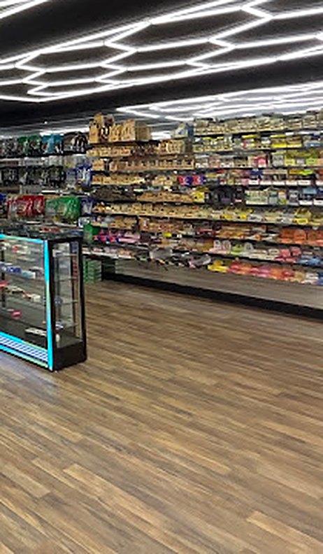 Stocked shelves along the right wall
